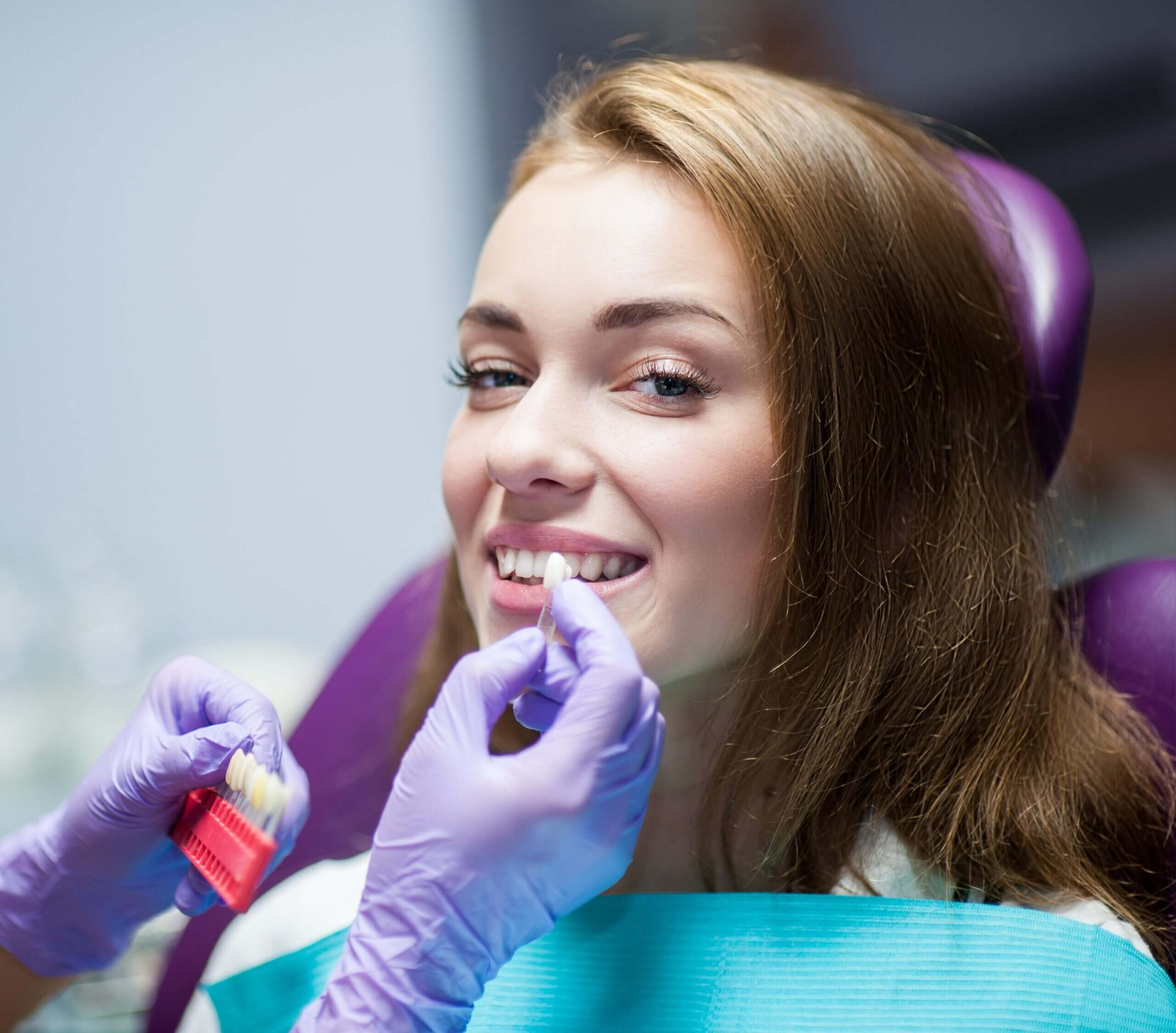 A patient at Tony Hill Dental is happy with her dental crown