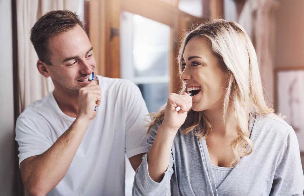 Dental Crown brushing A Tony Hill Dental patients brushing their teeth