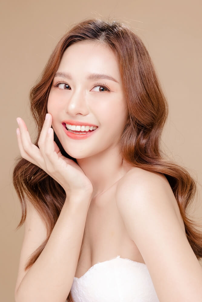 A pretty Tony Hill Dental patient showing her smile