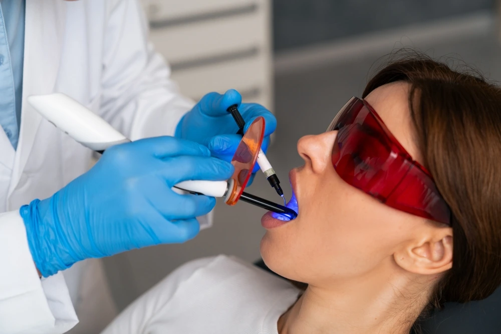 The close up image of a patient at Tony Hill Dental undergoing a dental check-up